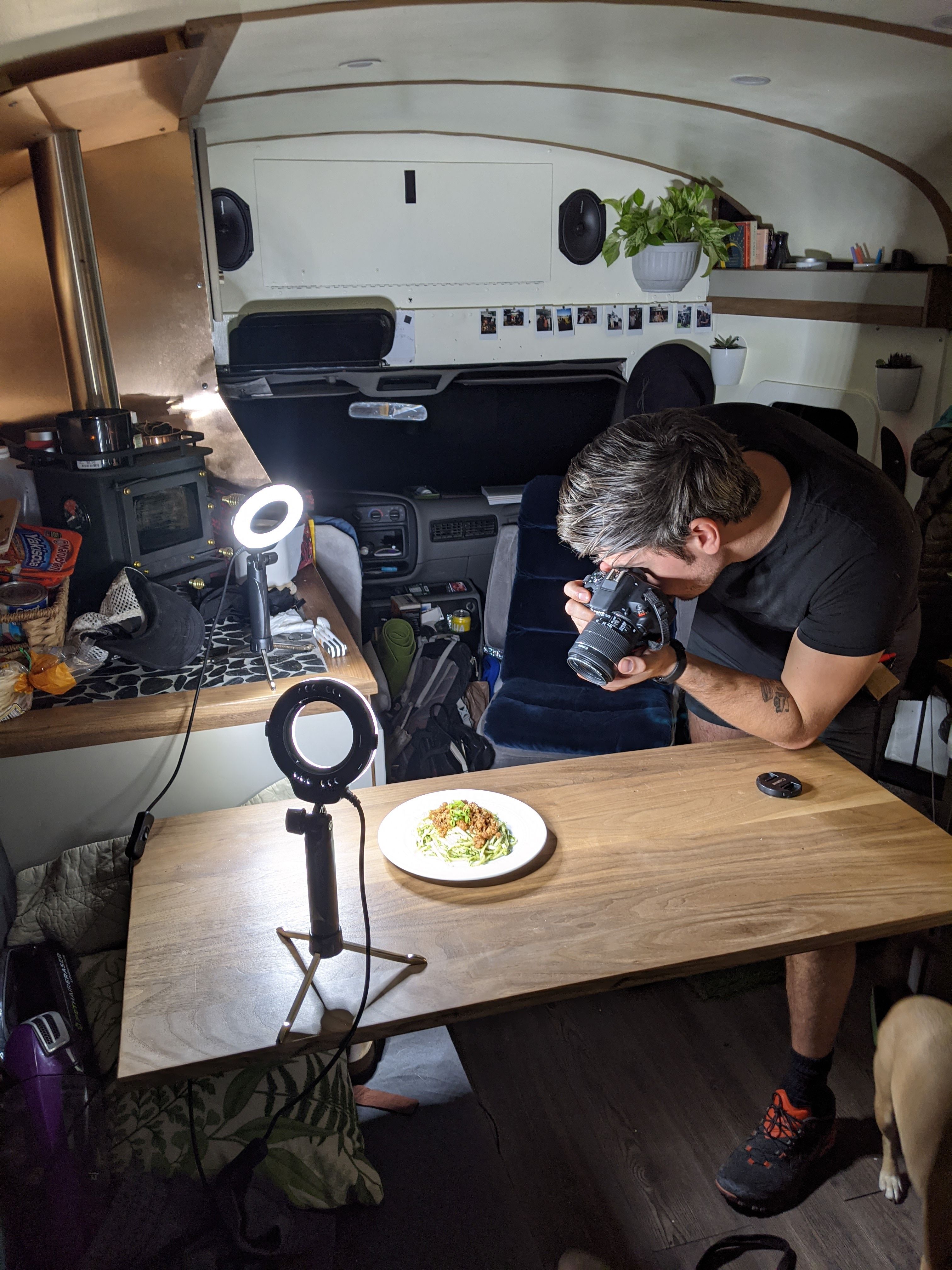 The author taking food photos on the bus.